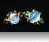 Two 18 carat yellow & white gold gemstone-set rings, featuring beautiful blue moonstones