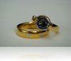 22 Carat gold wedder set with platinum dots.  18 Carat yellow gold & palladium ring with large sapphire