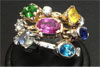 A mix of 3 multi set gemstone bands bands all in 18ct gold