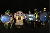 A collection of gold rings set with precious stones